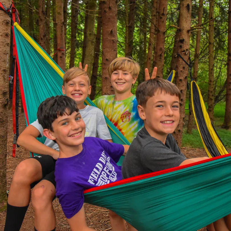 A group of boys in hammocks at YMCA Camp Watia.