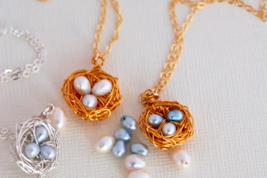 DIY craft project of bird nest necklaces.