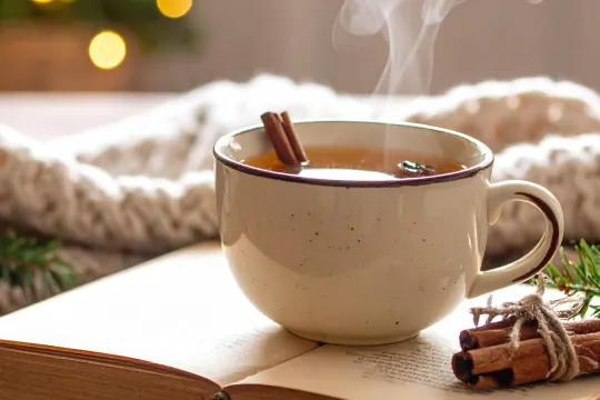Seasonal cup of tea and book