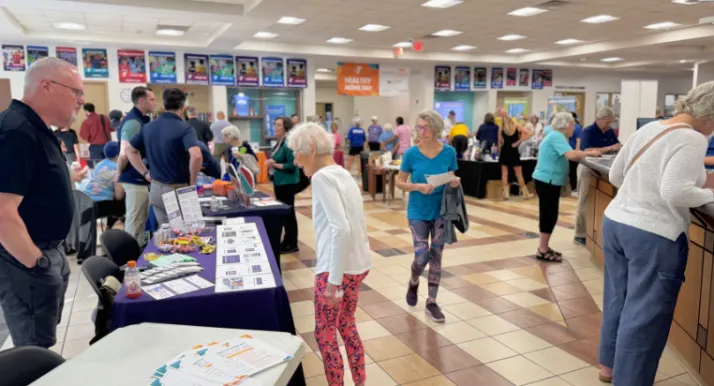 A group of older adults attend the Healthy Aging Day event at the Reuter Family YMCA.