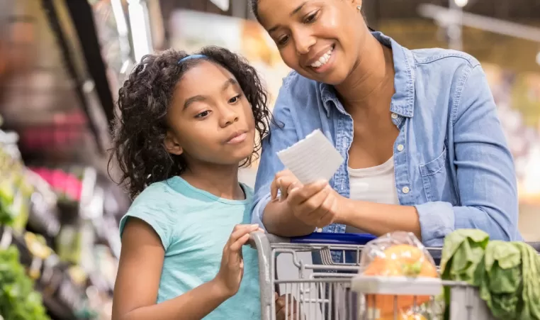 Mother and daughter grocery shop