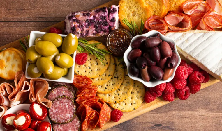 A charcuterie board on a table.