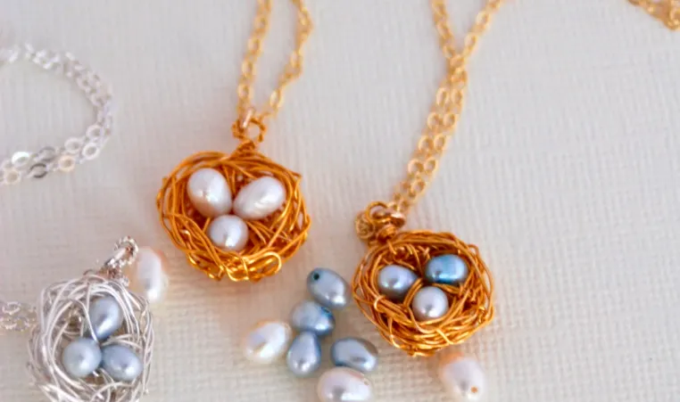 DIY craft project of bird nest necklaces.