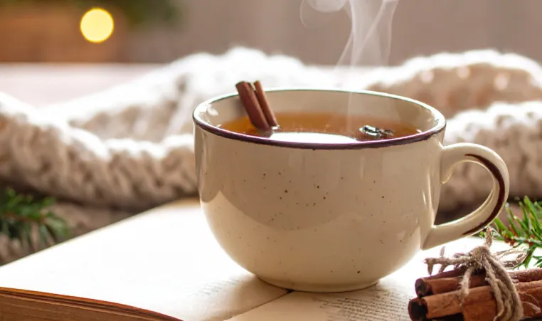 Seasonal cup of tea and book